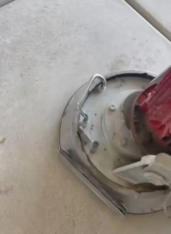 Concrete grinding prep before epoxy garage floor coating