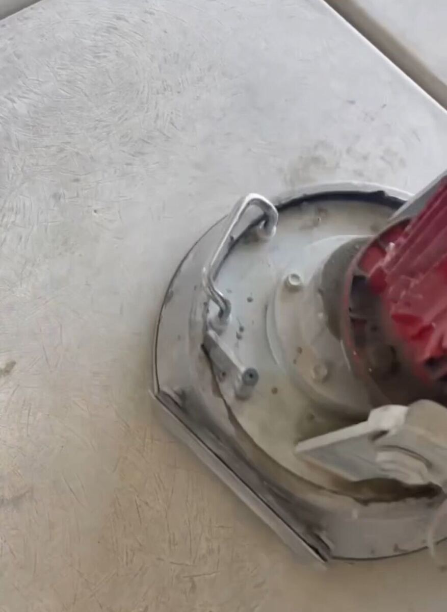 Concrete grinding and surface prep before epoxy garage floor coating