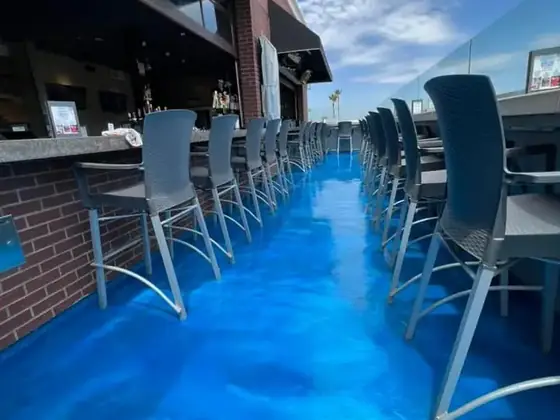 Blue metallic coating in a commercial patio style space