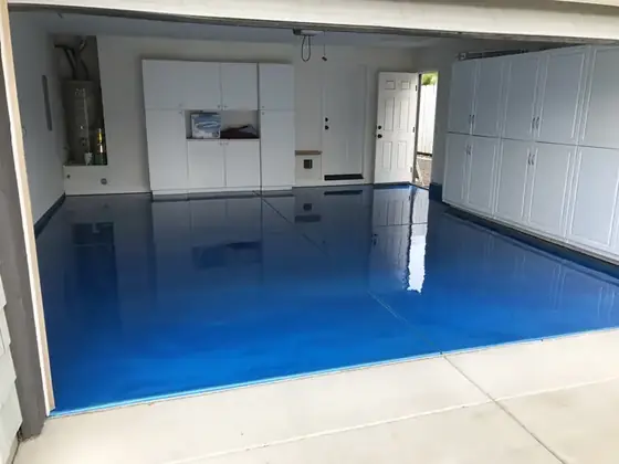Blue metallic epoxy garage floor finish