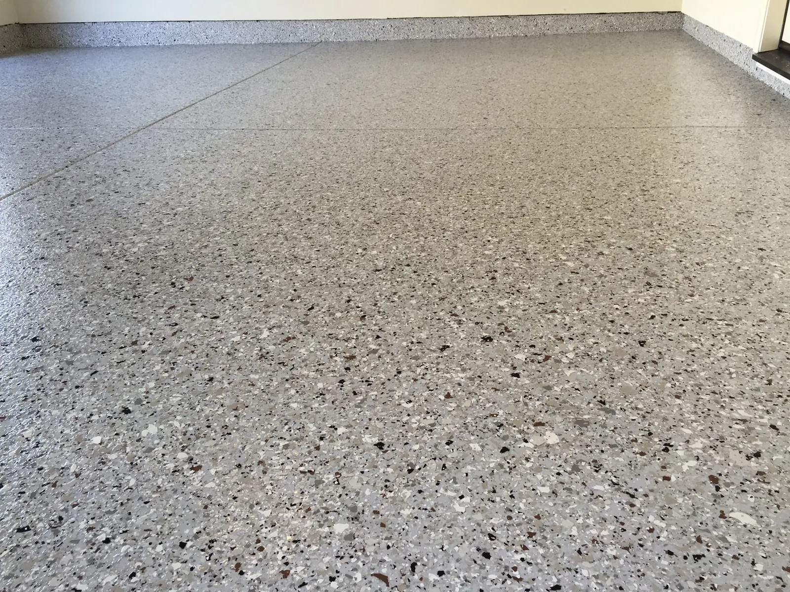 Neutral gray decorative flake floor coating option for Boise Idaho garages and workspaces