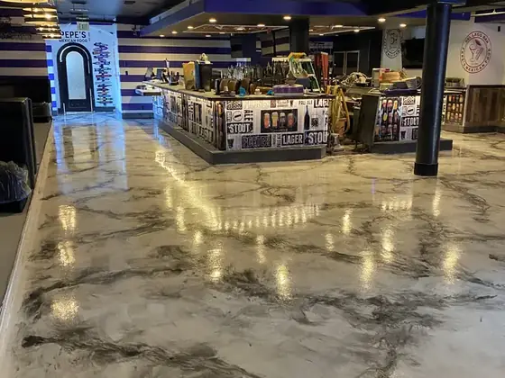 Commercial metallic epoxy floor by Epoxy Pros