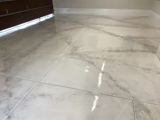 White marble metallic epoxy floor by Epoxy Pros